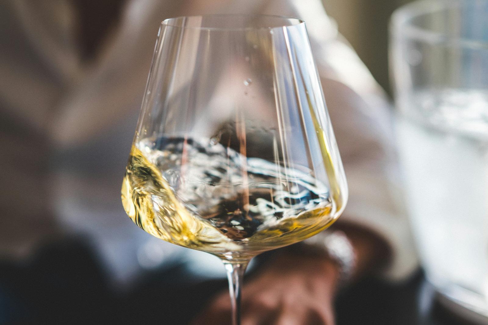 A glass of white vine